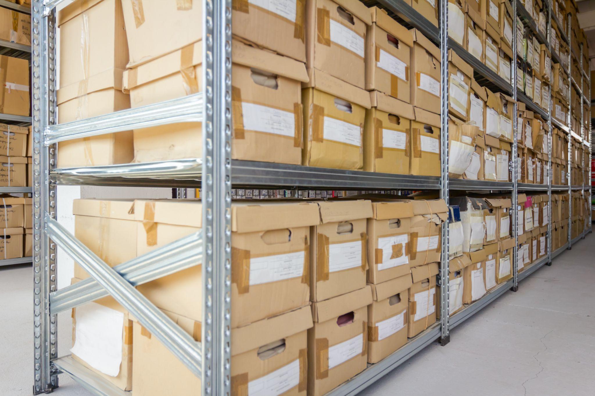 Business Document Storage for SMB 6 rows of brown archive boxes on a metal shelf