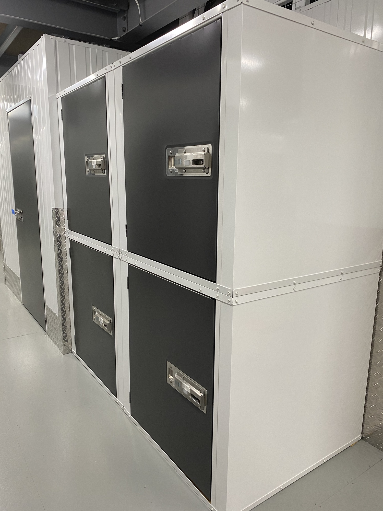 Storage lockers grey doors with white walls