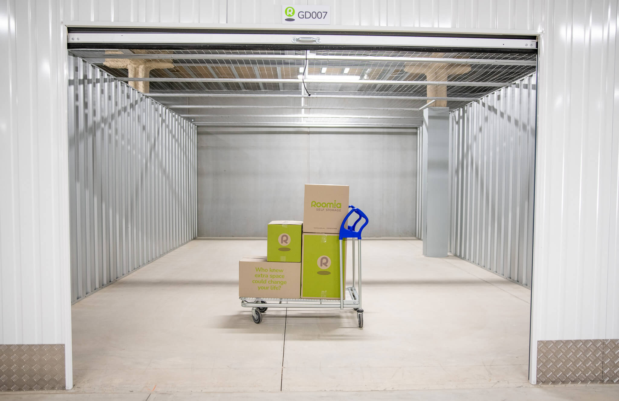 Inside unit with trolley and box shop cartons